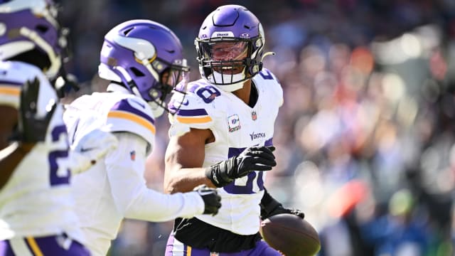 Oct 15, 2023; Chicago, Illinois, USA; Minnesota Vikings linebacker Jordan Hicks (58) celebrates after making an interception in the first half against the Chicago Bears at Soldier Field. Mandatory Credit: Jamie Sabau-USA TODAY Sports